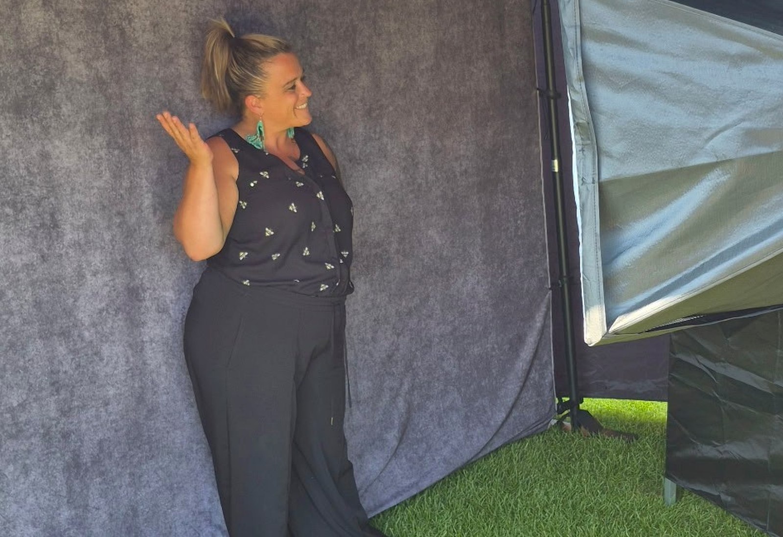 Danielle setting up the Raven's Occasions mirror photo booth at an outdoor event